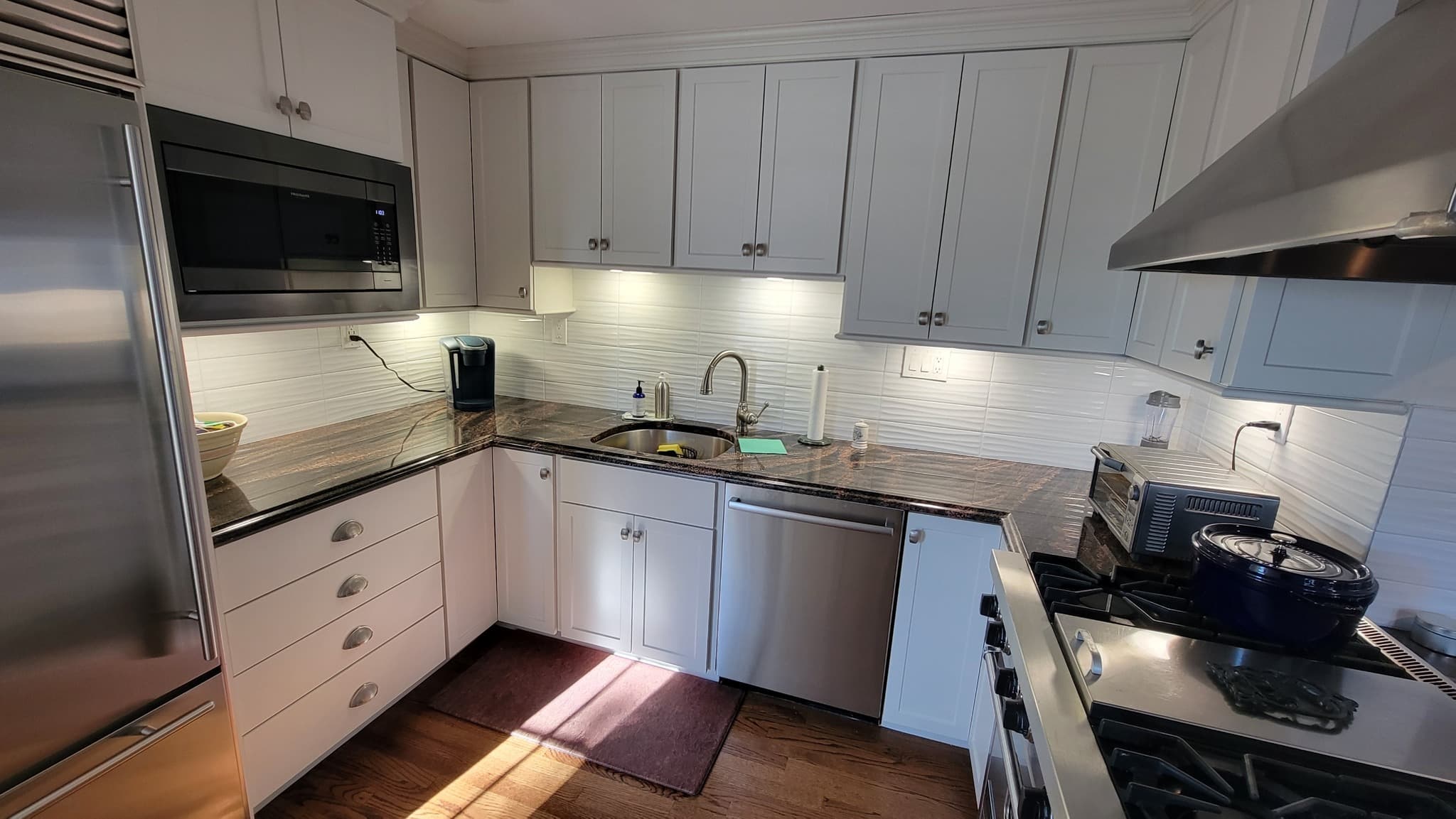 White cabinet refinishing by Heritage Coatings